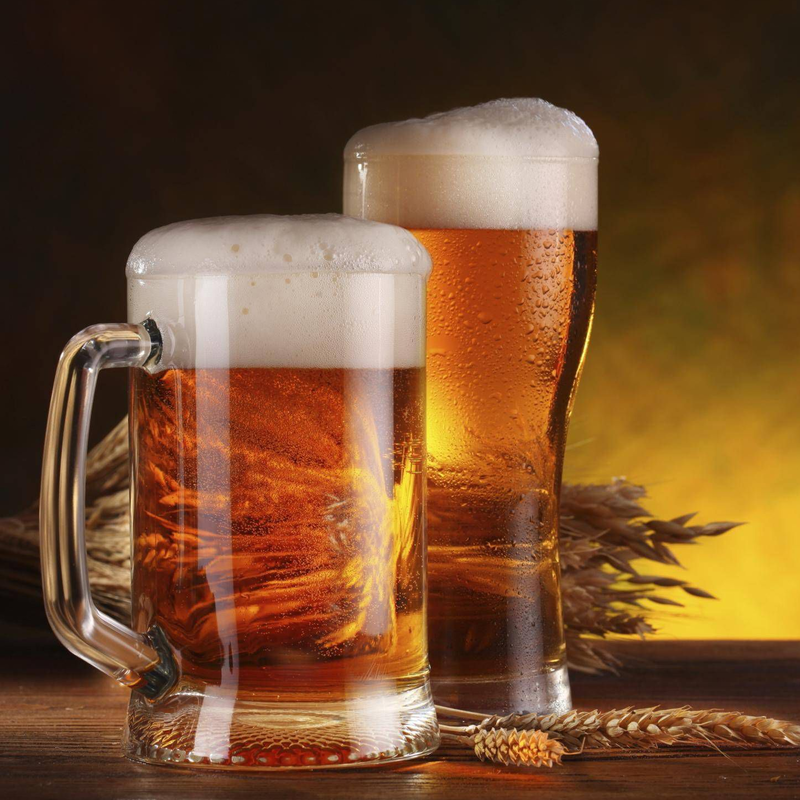 Two mugs of golden draft beer
