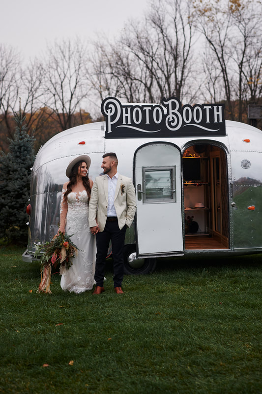 Guests posing at the Magic Mirror photo booth